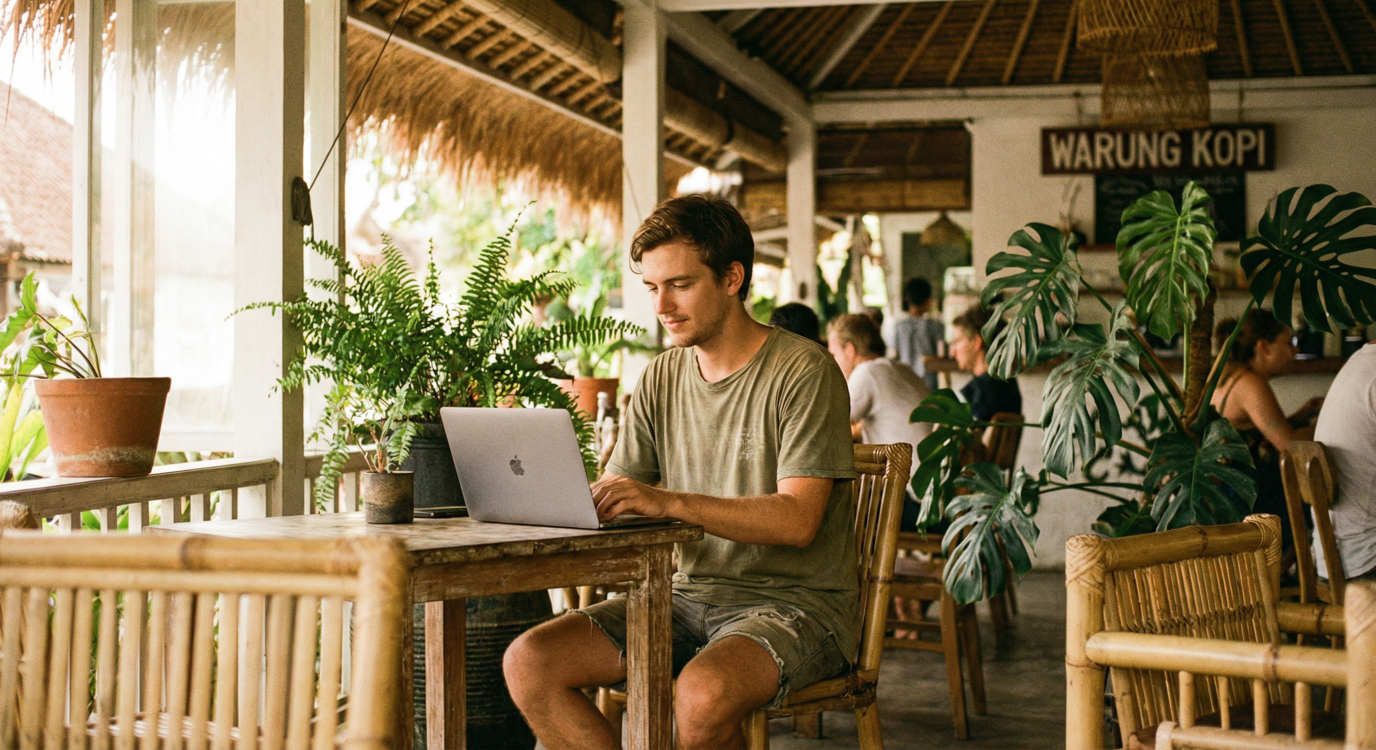 Digital nomad working from a cafe in Bali